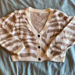 Women’s button up zebra-patterned cardigan